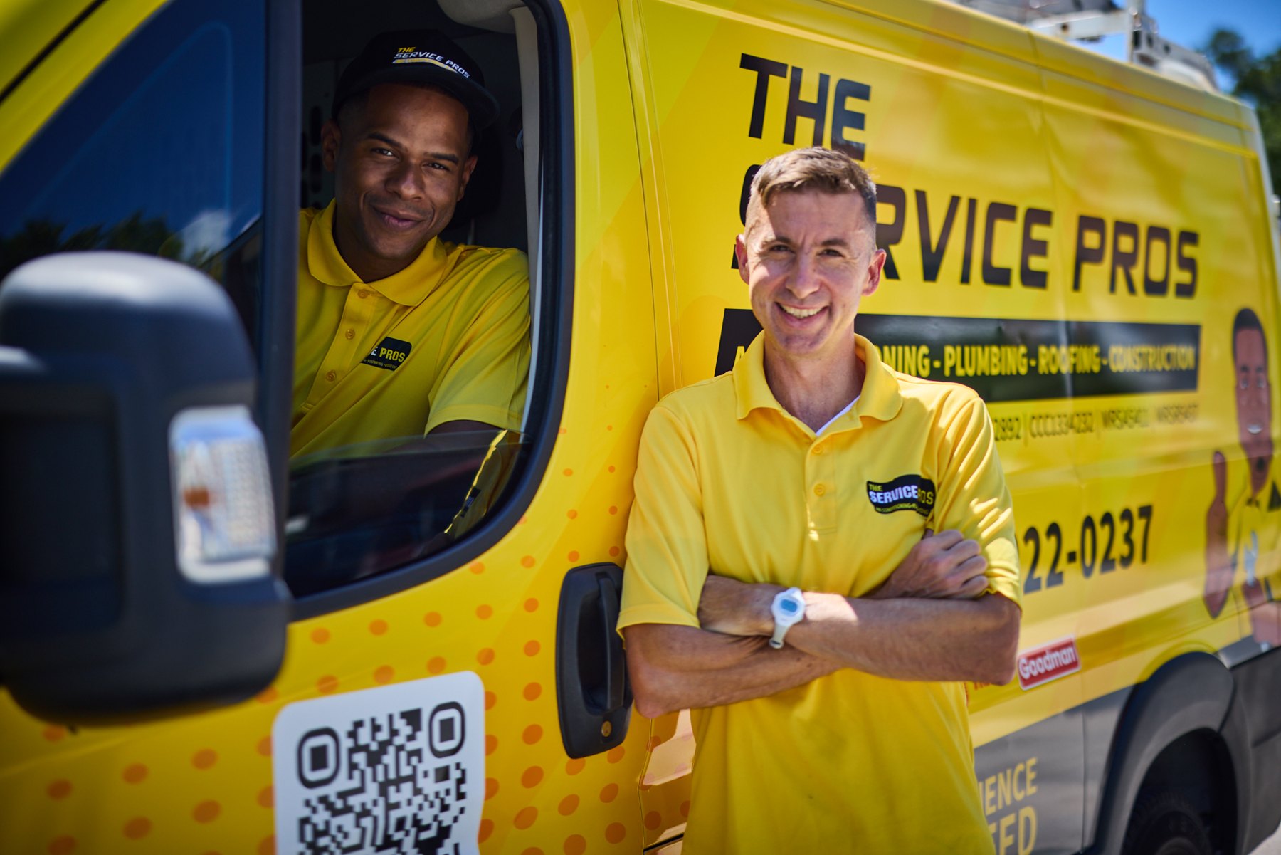 Service Pros technicians with a company van in Pinellas County